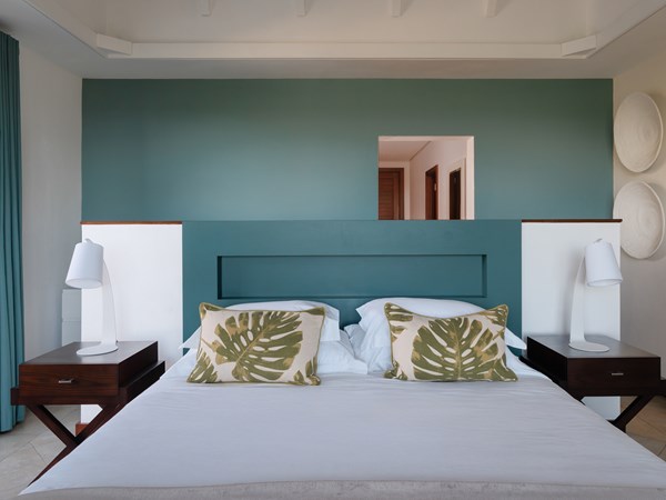 Une chambre de la 4 Bedroom Pool Villa