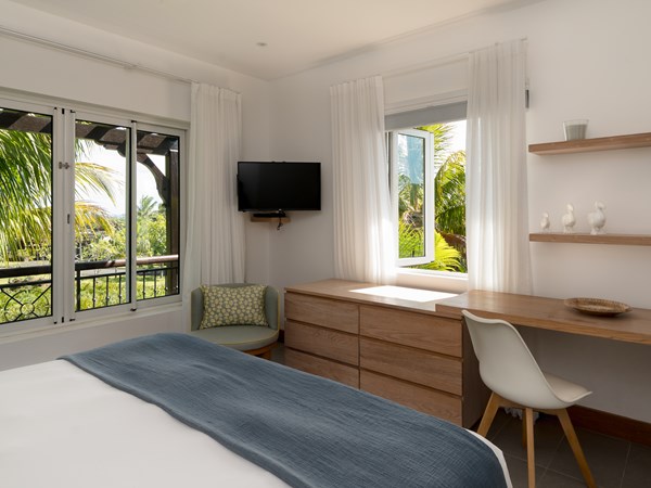 Une chambre de la 2 Bedroom Pool Villa