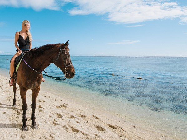 Balade à cheval sur la plage