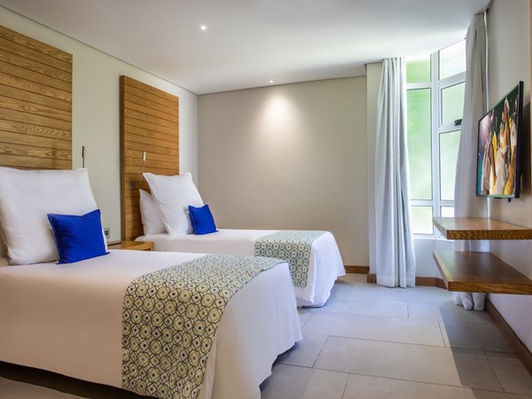 Deuxième chambre de la Paradis Luxury Family Suite Beachfront