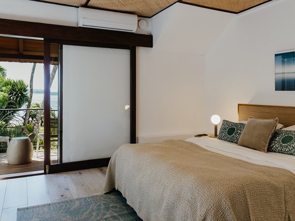 Une chambre de la villa avec sa terrasse